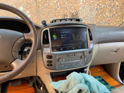 Магнитола для Lexus LX470 2002-2007 и Toyota Land Cruiser 100 (климат на цветном экране) - Carmedia KP-T1305, монитор 13.3" на Android 10, 6ГБ+128ГБ, CarPlay, 4G SIM-слот